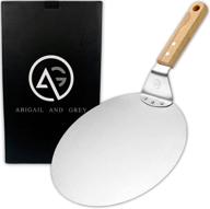 🍕 stainless steel metal pizza peel with wood handle by abigail and grey - pizza paddle and spatula for homemade pizza and bread baking - round 10-inch logo