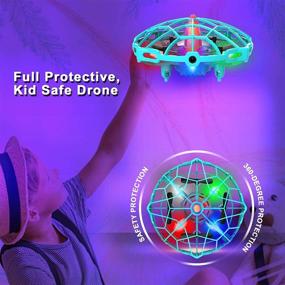 img 2 attached to ✈️ Dwi Dowellin 4.5 Inch Hand Operated Drones - 10 Mins Long Flight Time Mini Self Flying UFO Toys for Kids & Adults - Hands-free Throw and Go - LED Lights - Great Gift for Boys and Girls (Blue)