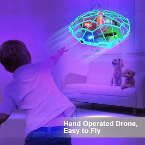 img 3 attached to ✈️ Dwi Dowellin 4.5 Inch Hand Operated Drones - 10 Mins Long Flight Time Mini Self Flying UFO Toys for Kids & Adults - Hands-free Throw and Go - LED Lights - Great Gift for Boys and Girls (Blue)