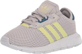 img 4 attached to 👟 Adidas Originals Yellow Indigo Toddler Boys' Shoes" - optimized product name suggestion: "Adidas Originals Yellow Indigo Toddler Boys' Sneakers