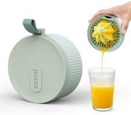 🍊 citrus orange lemon juicer manual hand press squeezer with built-in cup and abrader – efficiently extract fresh juice (green, 200ml) logo