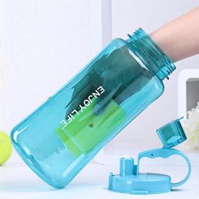 img 2 attached to 🚰 FASTDISK 2L Sports Water Bottles - High Capacity Portable Wide Mouth Plastic Bottles with Leakproof Design - BPA Free Travel Mugs with Scale, Straw, and Strap - Perfect for Kids, Adults, Summer Outdoor Sports