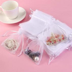 img 1 attached to 🎁 Foxnovo 100 Pack 9x12cm Organza Drawstring Gift Bags - Perfect Wedding Favor Bag Set in White