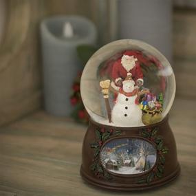 img 2 attached to 🎅 5-Inch Roman Christmas Musical Revolving Santa Claus and Snowman Snow Globe Glitterdome: Plays 'Have Yourself A Merry Little Christmas' in Multicolored Splendor