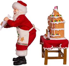 img 1 attached to 🎅 Kurt Adler 10.5-Inch Battery-Operated Fabriche Decorating LED Gingerbread House Table Piece Santa, Multi-Colored