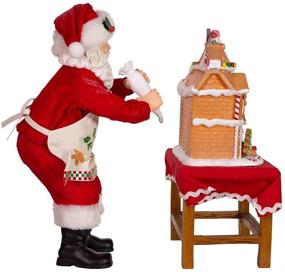 img 2 attached to 🎅 Kurt Adler 10.5-Inch Battery-Operated Fabriche Decorating LED Gingerbread House Table Piece Santa, Multi-Colored