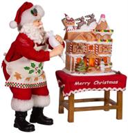🎅 kurt adler 10.5-inch battery-operated fabriche decorating led gingerbread house table piece santa, multi-colored logo