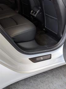 img 2 attached to Улучшите свой Tesla Model 3 с защитными пластинами задних дверных порогов QHO AUTO из нержавеющей стали - набор из 2 штук в элегантной черной отделке.