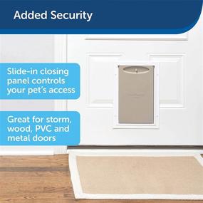img 1 attached to 🐾 Premium PetSafe Aluminum Dog and Cat Door - Sturdy Frame, Tinted Magnetic Vinyl Flap, Slide-In Closing Panel - Easy DIY Installation - Ideal for Small to X-Large Breeds