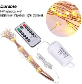 img 3 attached to 🎆 Waterproof Hanging Decorative Lights, Battery Powered 200 LED Firework Lights with Remote Control - Perfect for Gardens, Courtyards, Porches and Christmas Party Decorations - Warm White Starburst Lights
