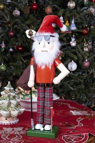 img 1 attached to Traditional Wooden Golfing Santa Nutcracker: Festive Christmas Décor for Shelves and Tables - Clever Creations