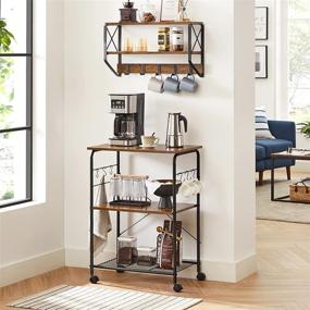 img 2 attached to 🛠️ VASAGLE 3-Tier Kitchen Bakers Rack, Storage Cart with Microwave Oven Stand, 6 Hooks, Grid Panel, Industrial Coffee Bar, for Toaster, Spices, Pots and Pans, Printer, Rustic Brown and Black (UKKS022B01)