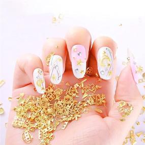img 3 attached to 💅 8 коробок набора для декорирования ногтей 3D: Золотые металлические штифты для ногтей, заклепки, звезды, луны, цветы, треугольники, сердечки, геометрические шармы - смешанные формы шармов для ногтей, декор для ногтей 3D с 1 шт. пинцетом для выборки.