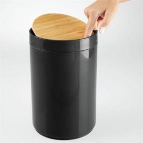 img 2 attached to 🗑️ mDesign Small Round Plastic Trash Can Wastebasket with Swing Top Lid - 1.3 Gallon/5 Liter Capacity - Versatile Container for Bathrooms, Kitchens, and Home Offices - Black/Natural Wood Finish