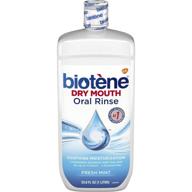 biotene oral rinse mouthwash: the ultimate dry mouth treatment and breath freshener in refreshing fresh mint - 33.8 fl oz logo