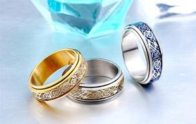 img 1 attached to 🐉 Кольцо с вращающимся кельтским драконом и волокнистым карбидом Hijones: Прочное стальное свадебное кольцо для мужчин и женщин
