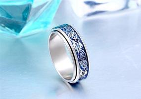 img 2 attached to 🐉 Кольцо с вращающимся кельтским драконом и волокнистым карбидом Hijones: Прочное стальное свадебное кольцо для мужчин и женщин