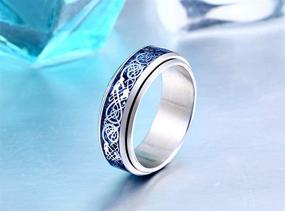 img 3 attached to 🐉 Кольцо с вращающимся кельтским драконом и волокнистым карбидом Hijones: Прочное стальное свадебное кольцо для мужчин и женщин