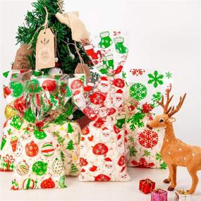 img 2 attached to 🎄 Whaline 150Pcs Christmas Cellophane Bags: Festive Candy Treat Bags with Twist Tie - Snowman, Xmas Tree, Snowflake, Boot Design - Perfect for Christmas Day Table Decor and Party Favors