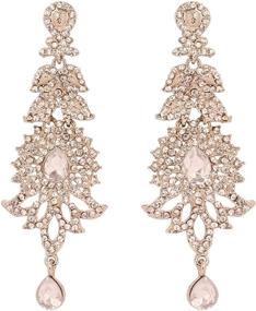 img 4 attached to Exquisite 'Touchstone Hollywood Glamour Oscar Collection' Indian Paisley Motif Designer Bridal Jewelry: Long Chandelier Earrings in Antique Gold and White Tone for Women