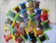 img 1 attached to 🌈 Rainbow Color Embroidery Floss Set - 50 Skeins | Cross Stitch Thread | Cotton Friendship Bracelet String | Craft Yarn for Bracelets, Cross Stitch, and Embroidery Projects review by Kelsey Brown