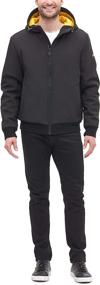 img 1 attached to Stylish and Functional: DKNY Men's Softshell Hooded Bomber Jacket - Stay Warm in Style!