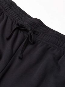 img 1 attached to 🔥 Stay Warm and Comfortable with Under Armour Men's Rival Fleece Pants