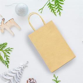 img 1 attached to 🎁 Pack of 100 Christmas Kraft Paper Bags - Brown Gift Bags with Handles Bulk for Christmas Gift Giving, DIY Party Bags, Christmas Party Favors - 5.25 * 3.75 * 8 Inches