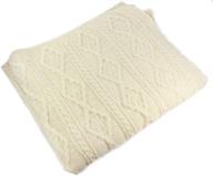 luxurious carraig donn aran knit irish merino wool blanket: exceptional quality and cozy comfort logo