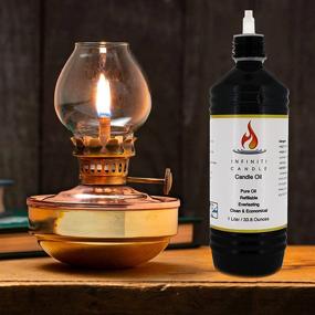 img 1 attached to 🔥 Refillable Oil Candle Fuel, 1 Liter, Clear and Safe for Indoor and Outdoor Use. Ideal for Torches, Lamps, and Lanterns. Smokeless, Unscented, with Child Safety Cap and Easy Pour Spout. Designed for Infiniti Oil Candle.