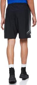 img 3 attached to Stay Comfortable and Stylish: Under Armour Men's Woven Graphic Shorts