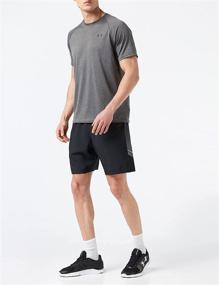 img 2 attached to Stay Comfortable and Stylish: Under Armour Men's Woven Graphic Shorts