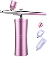 💄 fatuxz portable makeup airbrush set: mini air compressor ink spray pen for tattoo, nail art, face paint, cake decoration, coloring & more! (3 capacity cups, pink) logo