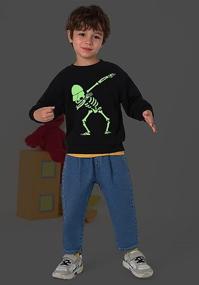 img 2 attached to 🎃 Halloween Skeleton Sweatshirts for Toddler Boys and Girls - Glow in The Dark Pumpkin Shirts Tops, ages 2-7 Years