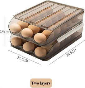 img 1 attached to Refrigerator Egg Holder with Automatic Rolling | Brown Transparent Drawer Egg Storage Box | Fridge Organizer for Household | Stackable Smart Devil Egg Container with Lid (Two Layers)