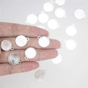 img 2 attached to 📿 ABBECIAO 100PCS 12mm Silver Bezel Pendant Trays Round Cabochon Settings Alloy Pendant Blanks for DIY Necklace, Earring, Jewelry Making with Photo Inserts (1/2 Inch)