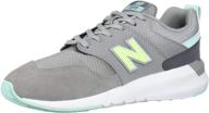 👟 new balance unisex-child 009 v1 sneaker: stylish and comfortable footwear for kids logo