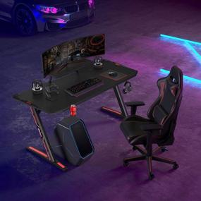 img 2 attached to 🕹️ Upgrade Your Gaming Setup with MOTPK Gaming Desk: 60 inch Z Shaped Home Office PC Computer Gaming Desk Table Carbon Coated - Complete with Monitor Stand, Controller Stand, Cup Holder & Headphone Hook - Black