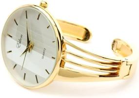 img 2 attached to 💫 Captivating Gold Tone String Style Band: A Luxurious Women's Bangle Cuff Watch