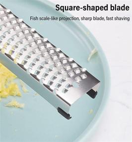 img 1 attached to KANKAN Cheese Grater & Lemon Zester - Parmesan, Ginger, Garlic, Chocolate - Razor-Sharp Stainless Steel Blade - Ideal for Vegetables, Fruits - Includes Protective Cover, Cleaning brush - Dishwasher Safe - Black