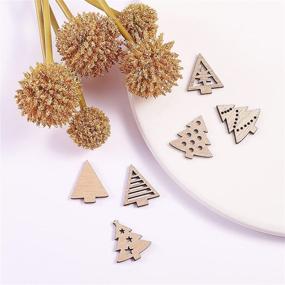 img 2 attached to 🎄 100-Piece Undyed Wood Pendants & Cabochons: Mini Christmas Tree Cutouts Flatback Wooden Charms Ornaments Hanging DIY Craft Xmas Decorations - 25~27mm by Airssory