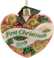 old world christmas first heart logo