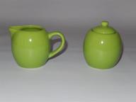 green ceramic creamer sugar service logo