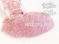 🐷 glitter backfist customs llc (miss piggy) logo