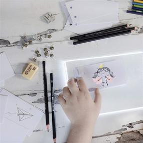 img 1 attached to 🎨 IttyBitty - LED Light Pad & Flip Book Kit for Kids, Drawing and Tracing Animation Tablet with 480 Sheets of Premium Flip Book Paper, Rubber Erasers, 6 Artist Drawing Pencils & USB Cable - Enhanced SEO-friendly Product Title
