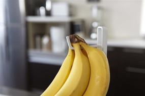 img 1 attached to Yamazaki Home Stand Banana Hanger: Neatly Display and Organize Your Bananas with Style in White | One Size