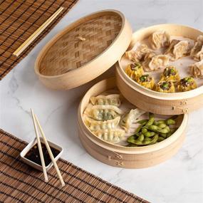 img 1 attached to 🎍 10-inch Bamboo Steamer Basket by Prime Home Direct - Dumpling Maker, Vegetable & Food Steamer, 2 Tier Steam Basket - Includes 2 Sets of Chopsticks, 1 Sauce Dish & 50 Liners - Multi-functional Steamer Basket