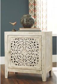 img 3 attached to 🏺 Vintage White Signature Design by Ashley Fossil Ridge Boho Accent Cabinet/End Table