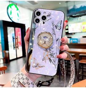 img 3 attached to 💜 Стильный чехол для iPhone 12 Pro Max: Милый голубой цветочный бабочечный узор с кольцевой подставкой, роскошный блестящий жемчужный корпус, защита камеры, фиолетовый