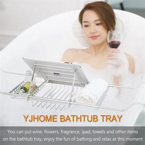 img 2 attached to YJHome Stainless Bathtub Tray Caddy: Expandable Nonslip Bath Table Tray with Wine Glass Holder, iPad Stand, and Luxury Bathroom Accessories